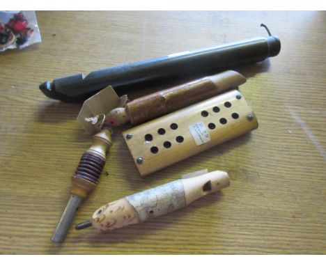 QUANTITY OF VARIOUS TREEN INSTRUMENTS VIZ WHISTLES AND A SMALL HARMONICA