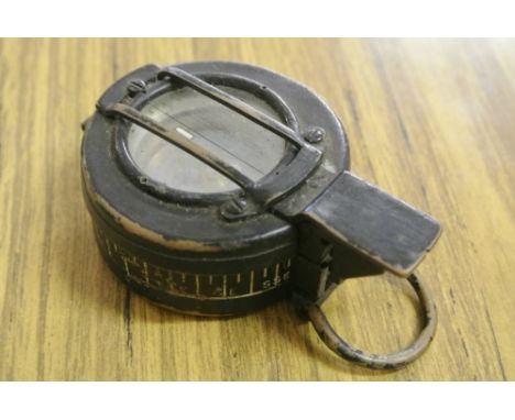 MILITARIA - An original brass WW2 compass, which has been painted black, stamped T.G.CO ltd, London, No B29975, 1940, MKIII, 