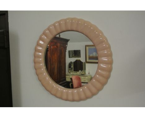 FURNITURE/ HOME - A vintage/ retro ceramic pink framed circular mirror.