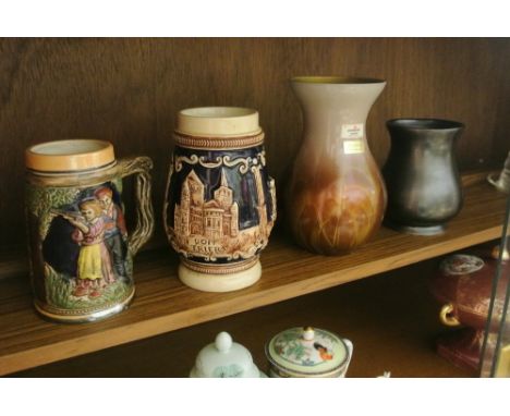 CERAMICS - A collection of 4 pieces to include 2 German beer steins, a vase & another ceramic English stein.