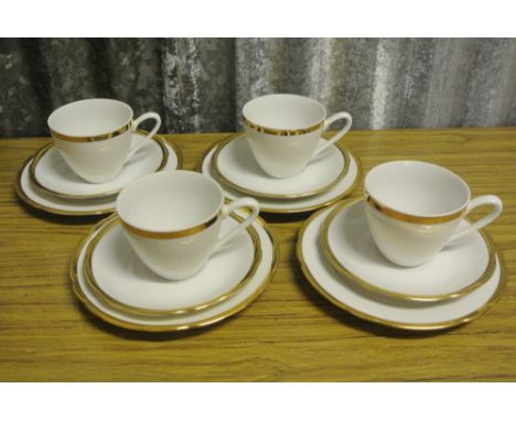 ANTIQUE/ TEACUPS - A collection of 4 matching cups, saucers & side plates in white & gold finish, produced by M Z of Czechosl