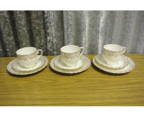 ANTIQUE/ TEACUPS - A collection of 3 matching cups, saucers & side plates, produced by Taylor & Kent.