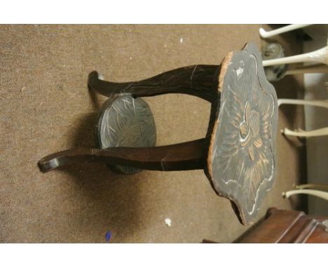 FURNITURE/ HOME - A small hand carved plant pot tripod table with floral motif.