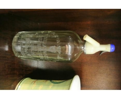 ANTIQUE/ COLLECTABLE - A vintage glass soda syphon with inscription reading 'Mineral Water Distributors Ltd - Dublin', with a