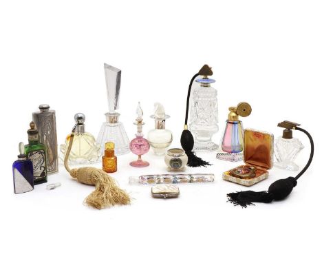 A collection of perfune bottles and dressing jars, to include a cut glass atomiser bottle with silver top with blue guilloché
