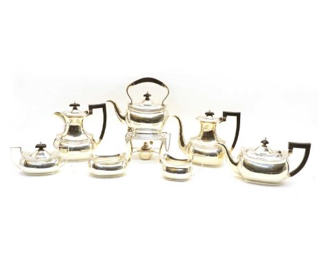 An extensive silver seven-piece matched coffee and tea service, by Barker Brothers Silver Ltd 1938 and 1939, comprising teapo