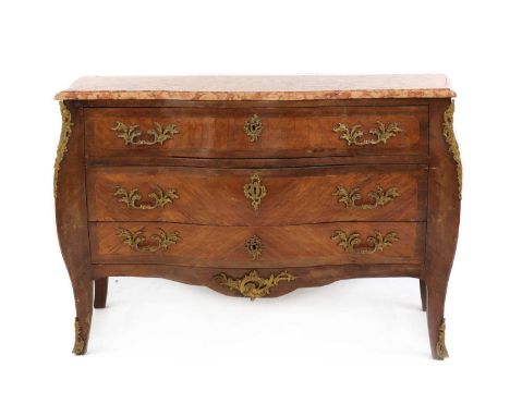 A French 18th century and later Louis XV style mahogany bombe commode, with a shaped marble top, over three drawers, with tul