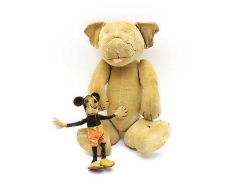 A Chad Valley stuffed toy 'Bonzo', 32cm long; and a figure of Mickey Mouse, 17cm (2)Condition report: Both worn and stained -