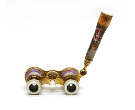 A pair of enamelled and mother-of-pearl mounted opera glasses, decorated with ladies and cupids, with a swing handle, 10cm wi