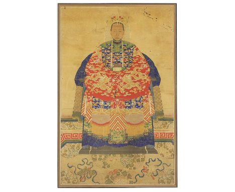 A Chinese ancestor portrait, late Qing dynasty, of a lady in court robes with the fifth civil rank badge of a silver pheasant