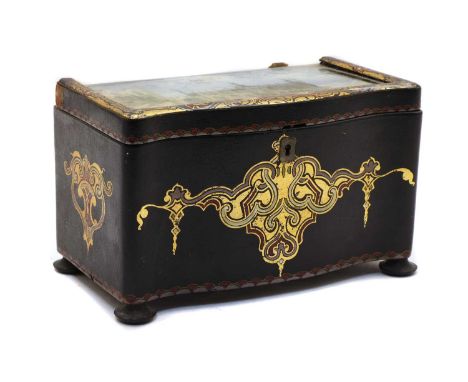 A Victorian papier-mâché tea caddy, with painted gilt decoration, internally with two compartments with mother of pearl handl