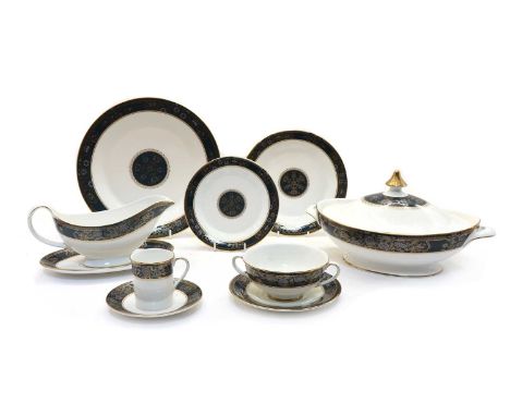 A Royal Doulton Carlyle six-setting dinner service, 20th century, comprising a pair of tureens, dinner plates, salad plates, 