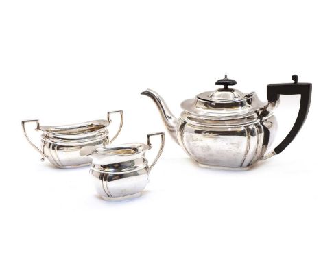 A silver three piece tea service by Viner's, of ovoid form, fitted angular handles, Sheffield 1933, approximately 36 oztCondi