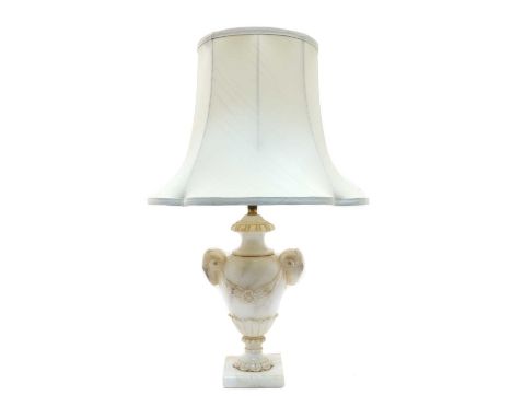 A white hardstone table lamp of classical urn form, with Ramshead handles and square plinth base, 57cm high including shadeCo