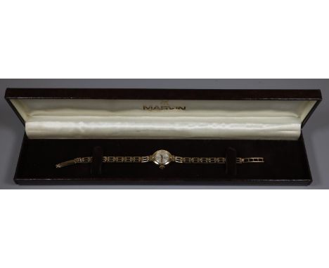 Marvin Revue ladies 9ct gold wrist watch, 9ct gold square link chain bracelet, overall 12.3g approx. In original box.(B.P. 21