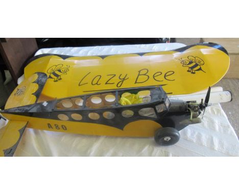 Flying scale model of a 1930's monoplane civil aircraft 'Lazy Bee' with single cylinder petrol engine. Overall 127cm long app