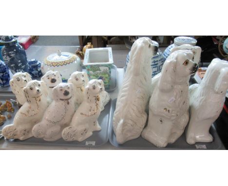 Collection of 19th and 20th century Staffordshire dogs all with cream bodies, black features and gilt highlights. 4 Larger St