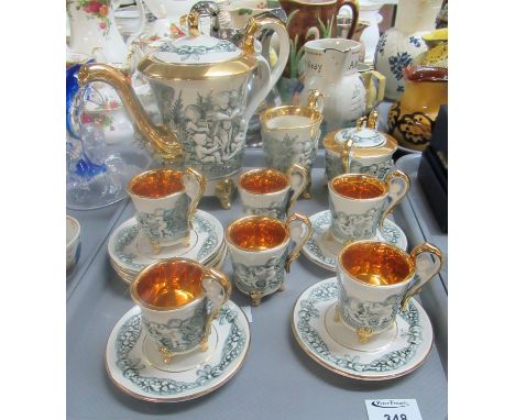 Capodimonte coffee set - relief decorated in grey and white with cherubs and fruit garlands with gilt interiors and gilt high