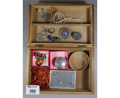 A collection of silver jewellery including coral beads, a silver and enamel brooch, amber etc.(B.P. 21% + VAT) 