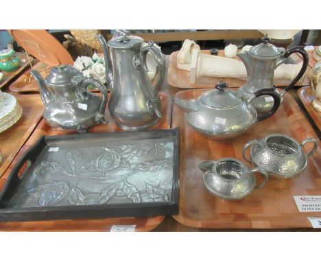 Two trays of metalware to include: small white metal tray, possibly pewter, embossed with pomegranate branches and with an eb