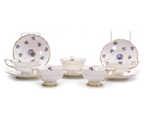 A Royal Stafford porcelain Sweet Violets pattern part tea service, printed marks, comprising five cups and saucers.