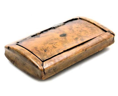 A 19thC burr walnut snuff box, with a hinged lid, opening to reveal a label "This box was presented to me by Monsieur Sevigne