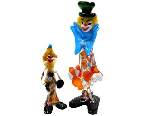 A Murano glass figure of a clown, with a turquoise bow tie and holding a bottle of wine, 42cm high, and a further figure of a