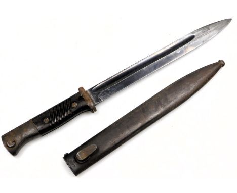 A German Third Reich K98 bayonet, the blade stamped 4338 and 42COF, scabbard stamped FZE42, and 4428, 38cm long.