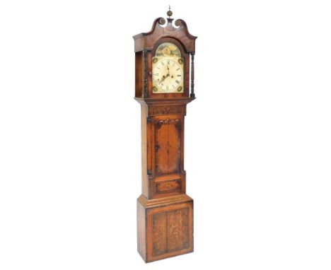 A Georgian oak and mahogany longcase clock by William Green of Grantham, the enamelled break arch dial painted with an homest