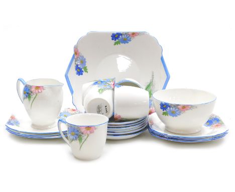 A Shelley porcelain Strand shape part tea service, circa 1930s, decorated with pink and blue daisies, pattern 12216, comprisi