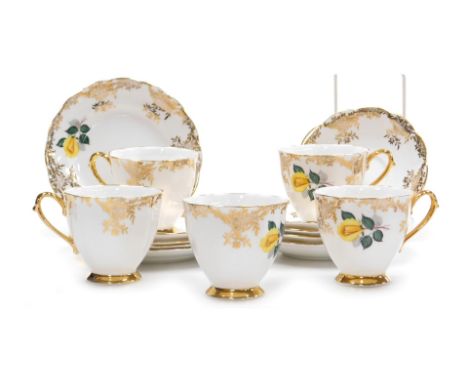 A Royal Standard porcelain Yellow Rose pattern part tea service, printed marks, comprising five tea cups, saucers and plates.