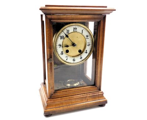 A late 19thC mahogany cased mantel clock, brass circular dial with enamel chapter ring bearing Arabic numerals, eight day mov