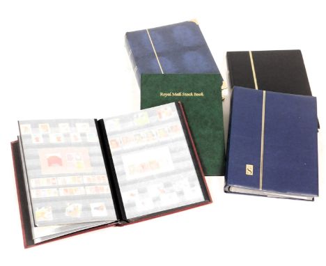 Philately.  GB mint commemoratives, in sets and higher value blocks, and some definitives, in five albums or stock books.