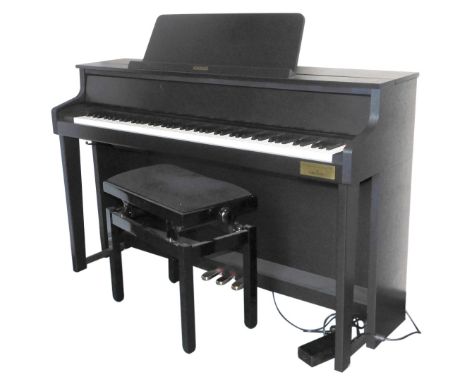 A Casio Celvianor electric piano, model GP-310, developed in calibration with C Bechstein, 143cm wide, together with a stool.