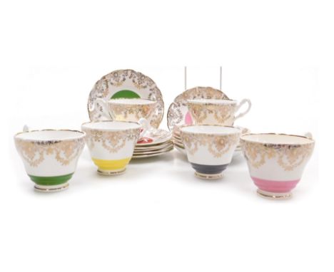 A Winston China porcelain harlequin part tea service, with gilt swags and medallions decoration, printed marks, comprising si