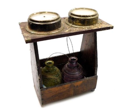 A Metamec clock and barometer, wall mounted, 38.5cm wide, together with a wooden bottle holder and two glass garden lanterns.