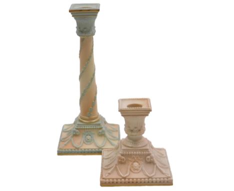 A Royal Worcester candlestick, c1894, of composite classical form, printed marks, 26.5cm high, and a further Royal Worcester 