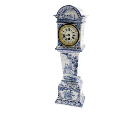 A 19thC Delft ware blue and white miniature long case clock, circular enamel dial bearing Roman and Arabic numerals, thirty h