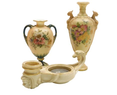 An early 20thC Royal Worcester blush porcelain Roman oil lamp formed candle holder, c1903, with a scrolling bird handle, and 