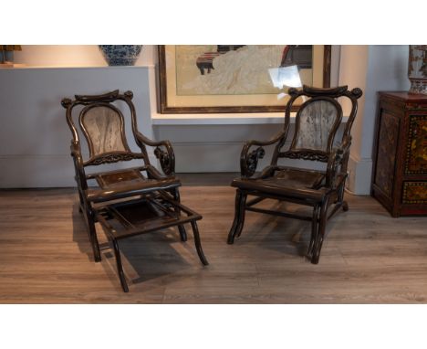 PAIR OF 20TH CENTURY CHINESE HARDWOOD 'MOON GAZING' CHAIRS, With floral carved headrests, Dali marble inset backs, scrolled a