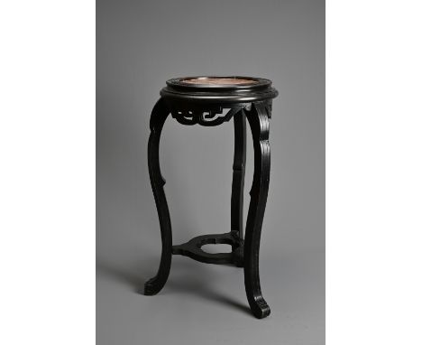 A CHINESE STYLE JARDINIERE STAND WITH RED MARBLE TOP, 20TH CENTURY. On three curved scroll legs with carved and pierced friez