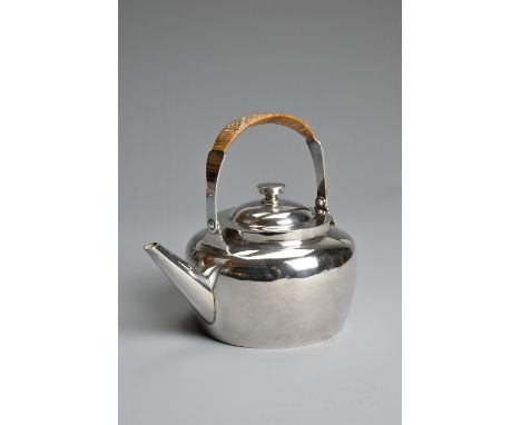 CHRISTOPHER DRESSER (BRITISH 1834-1904) SILVER PLATED TEAPOT BY HUKIN & HEATH, LONDON, C.1884. With wicker handle. Registrati