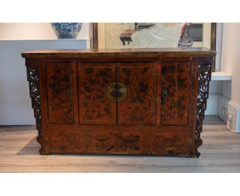 EARLY 20TH CENTURY CHINESE LACQUERED ALTAR TABLE, with carved dragon panels on either side and painted decorations of birds a