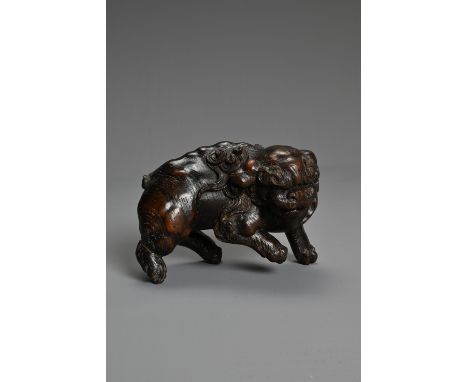 JAPANESE CARVED WOOD MODEL OF A MYTHICAL BEAST, 19TH/20TH CENTURY, in prowling pose, carved with detail to curled eyebrows, m