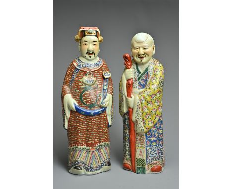 TWO CHINESE POLYCHROME DECORATED PORCELAIN FIGURES, 20TH CENTURY. The Gods of fortune deities dressed in robes holding a ruyi