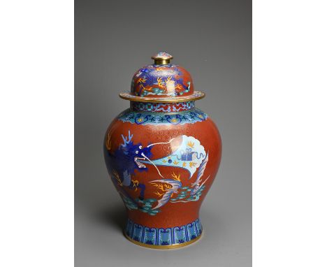 A CHINESE CLOISONNÉ ENAMEL JAR WITH COVER, 20TH CENTURY, Of baluster form decorated with Qilin and other Chinese motifs on an