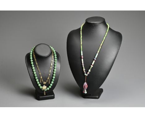 THREE NECKLACES. To include a ceramic beaded necklace; A jade stone beaded necklace mounted with silver clasp, marked silver,