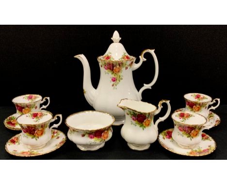 Royal Albert Old Country roses part coffee service comprised of; a coffee pot, milk jug, sugar bowl, four coffee cups and six
