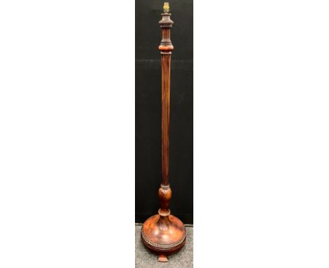 An early to mid 20th century standard lamp, turned and reeded column, turned circular base, 158cm high.