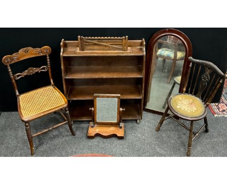 Furniture - a 19th century carved walnut side chair, split-cane weave seat;  mahogany arch-top wall mirror, 97cm high x 43.5c